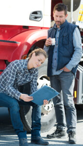 Lady and Man Standing by Truck with Commercial Vehicle Insurance in Lake Elsinore, CA