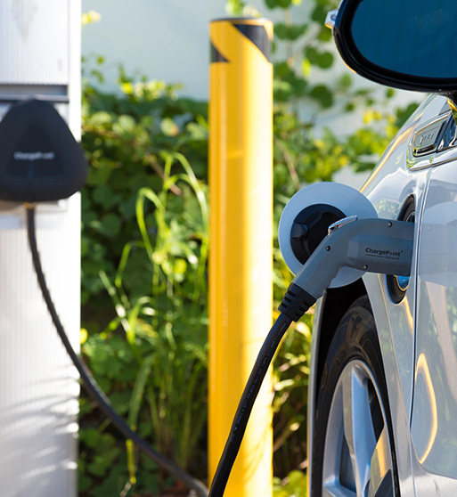 Ev 2 parked electric car charging with ev insurance